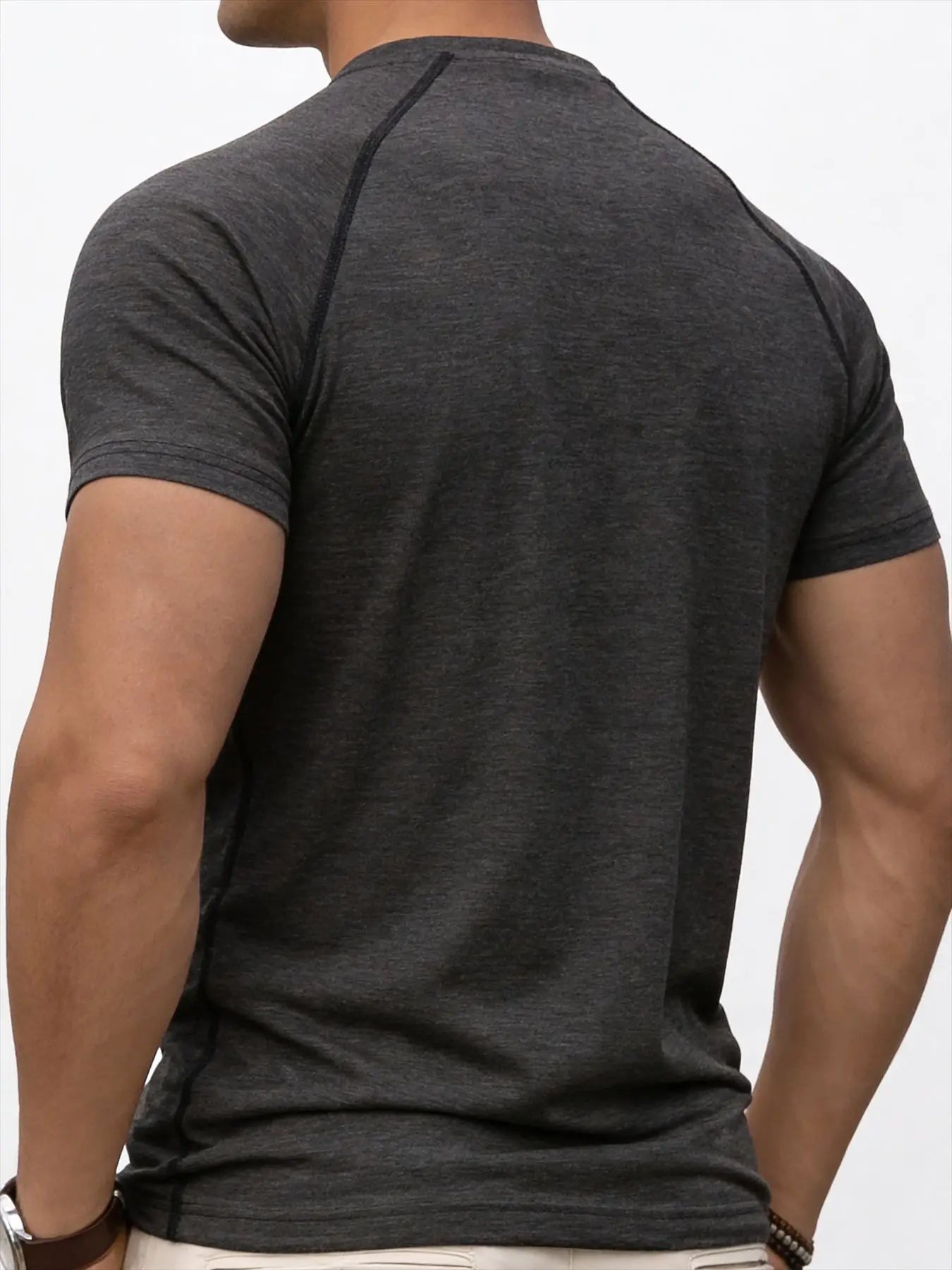 Men's fitness sports T-shirt for training, showing muscles, loose fit, suitable for summer fashion and casual running.