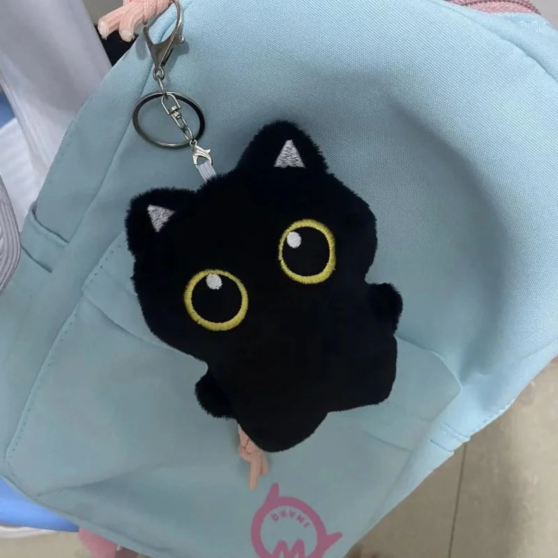 Cute plush toy of a black cat, suitable for decoration and also a great gift option.