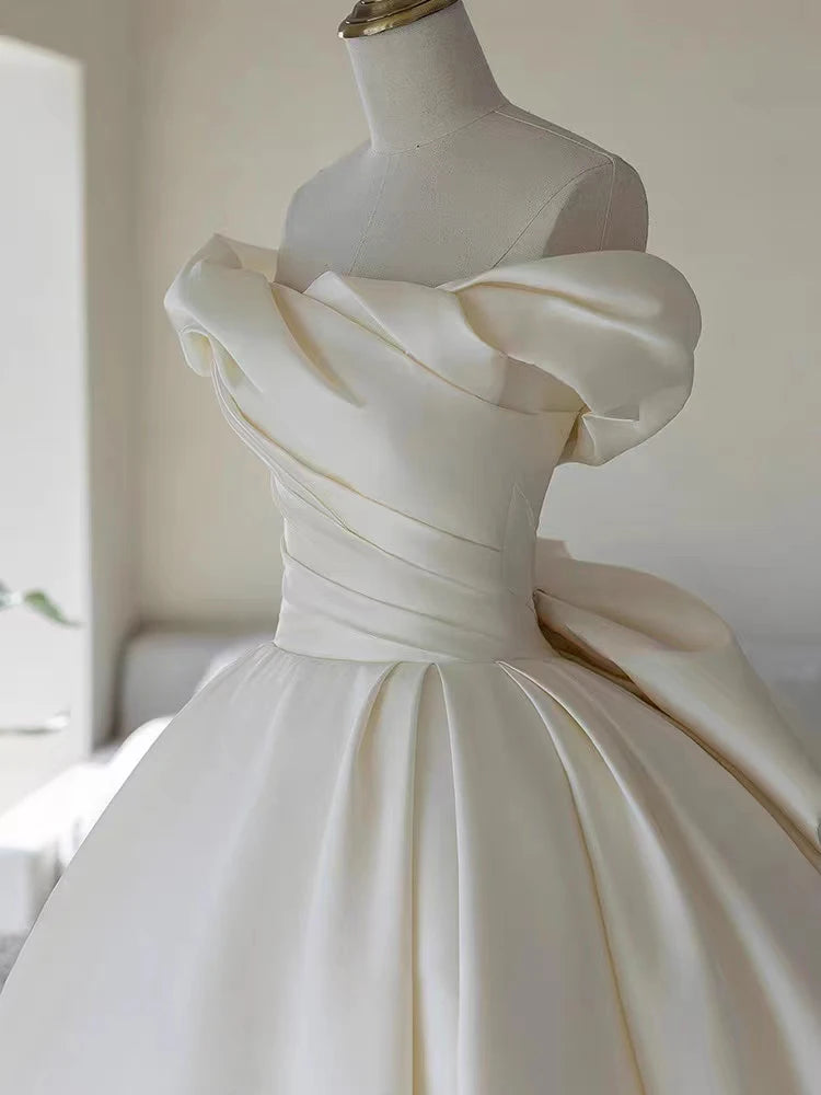Elegant Satin Off-Shoulder Wedding Dress with Bow Detail