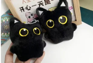 Cute plush toy of a black cat, suitable for decoration and also a great gift option.