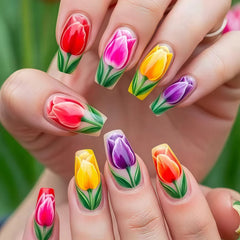 24PCS of false nails with a nude base coat and a shiny black surface and featuring a mirror-gold metallic French tip design